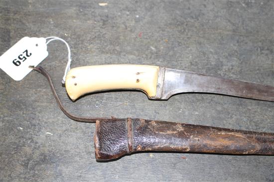 An Indian dagger pesh kabz, ivory grips, silver covered hilt and leather scabbard, late 18th century, overall length 31.5cm